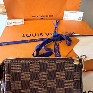 The Mini Pochette Accessoires in Damier Ebene canvas is perfect.